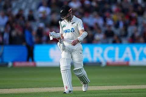 New Zealand's Kane Williamson leaves the pitch after losing his wicket during the second day of the test match between England and New Zealand at Lord's cricket ground in London.