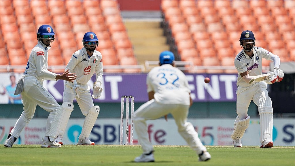 India's KL Rahul, right, bats on Day 1 of the Test match between Afghanistan and India in New Chandigarh, India on Saturday, June 6, 2026.  - AP Photo/Ashwini Bhatia