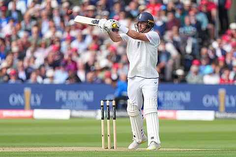 England's Ollie Robinson plays a shot off the bowling of New Zealand's Kyle Jamieson during the second day of the test match between England and New Zealand at Lord's cricket ground in London.