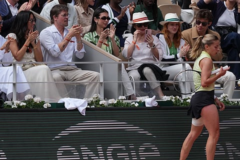 American actor Brad Pitt applauds during the final tennis match between Poland's Maja Chwalinska and Russia's Mirra Andreeva at the French Open in Paris.