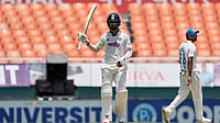 (AP Photo/Ashwini Bhatia) : India's KL Rahul celebrates his fifty runs on day one of the cricket test match between Afghanistan and India in New Chandigarh, India, Saturday, June 6, 2026.