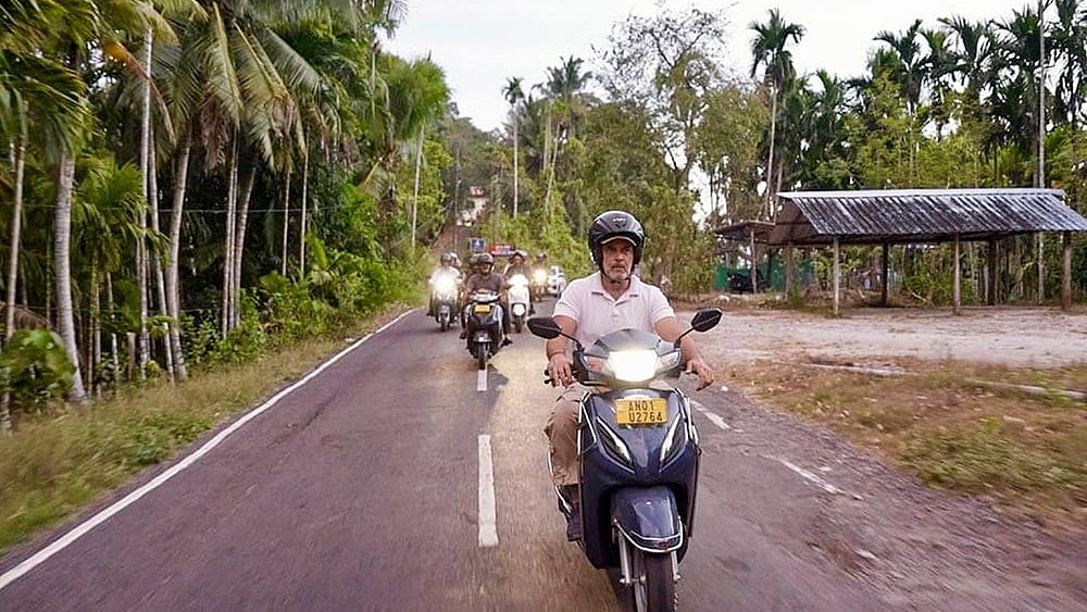 In this image posted on June 5, 2026, Congress leader Rahul Gandhi rides a scooty during a visit to the Andaman and Nicobar Islands. - Photo; @INCIndia/X via PTI