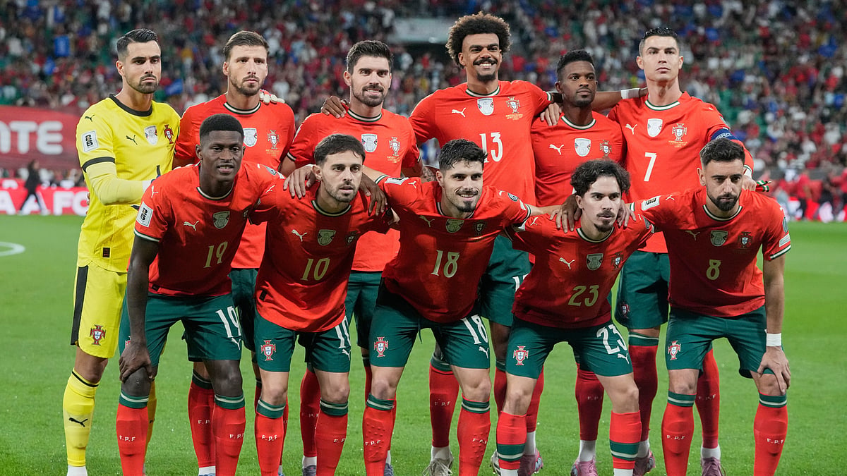 Portugal players pose for a team photo before a World Cup 2026 group F qualifying soccer match between Portugal and Hungary in Lisbon. - AP Photo