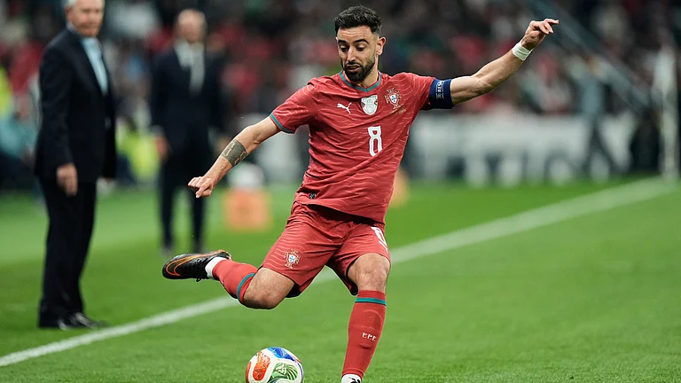 Portugal's Bruno Fernandes passes the ball during the international friendly soccer match between Mexico and Portugal in Naucalpan, Mexico. - AP Photo