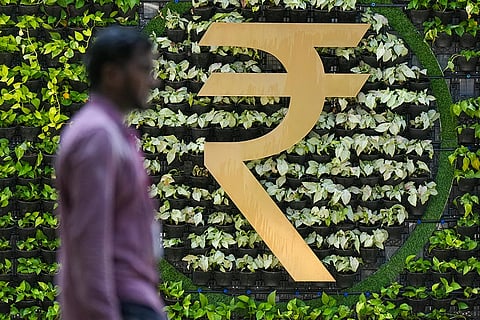 Rupee logo at Reserve Bank of India (RBI) headquarters, in Mumbai, Maharashtra. The rupee appreciated 50 paise to 95.24 against the US dollar on Friday after the RBI liberalised norms for FPI investment in government securities