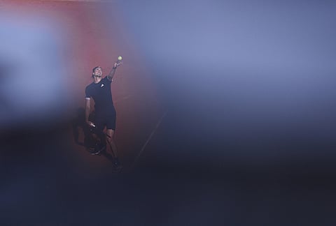 Alexander Zverev of Germany serves to Flavio Cobolli of Italy during their men's final match at the French Open tennis tournament in Paris.