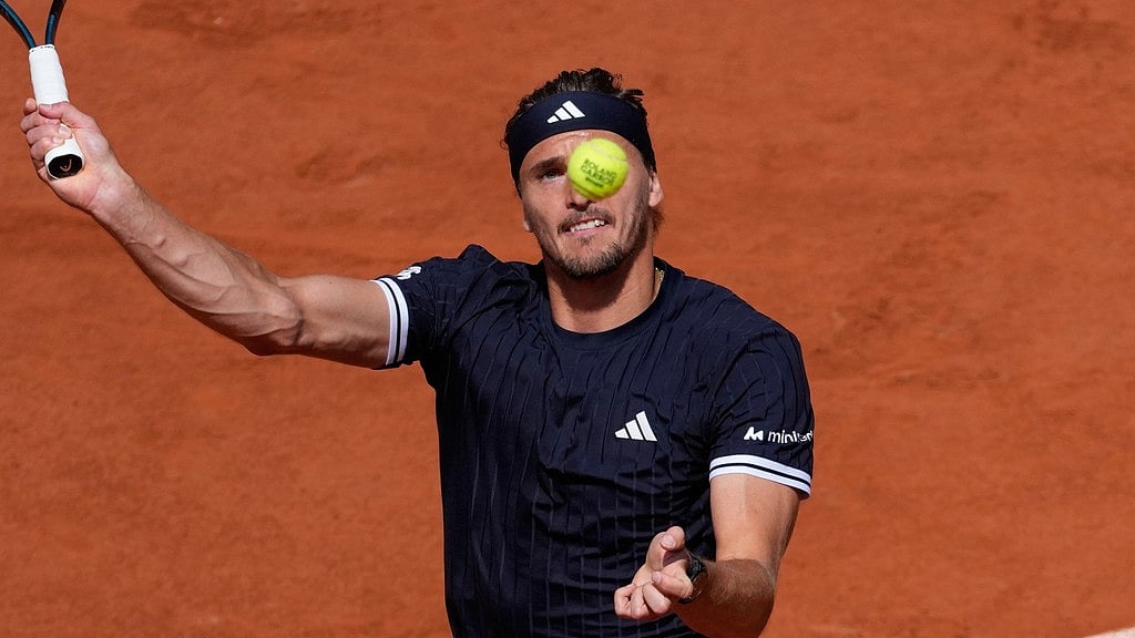 Alexander Zverev of Germany returns to Flavio Cobolli of Italy during their men's final match at the French Open tennis tournament in Paris, Sunday, June 7, 2026.  - AP Photo/Christophe Ena