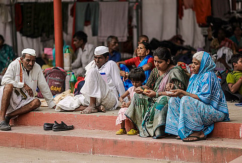 People take rest, who came for the fish medicine ahead of the 'Mrigasira Karthi' at Nampally Exhibition ground, in Hyderabad, Telangana.