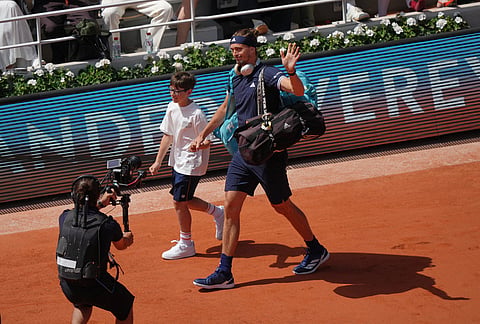 Alexander Zverev of Germany enters the court for the men's final match against Flavio Cobolli of Italy at the French Open tennis tournament in Paris.
