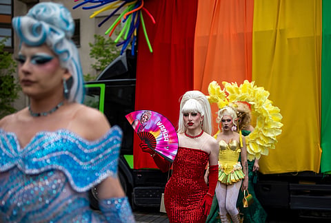 Revelers take part in a Pride parade in Vilnius, Lithuania.
