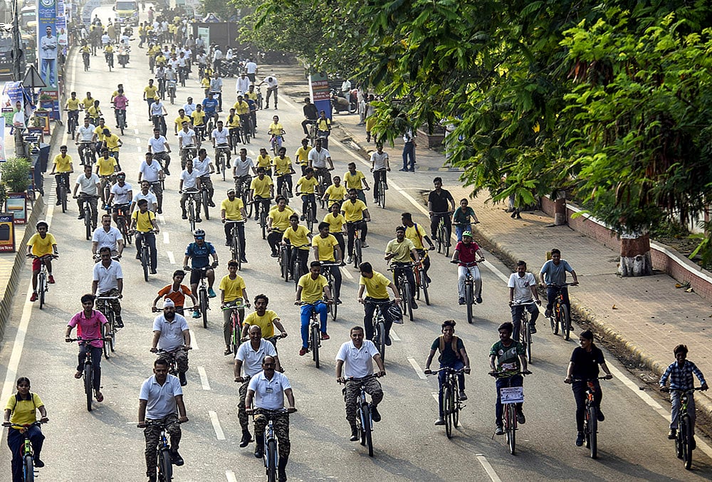 People ride bicycles during 'Fit India Cyclothon' organised to mark 'World Bicycle Day', in Patna. - | Photo: PTI