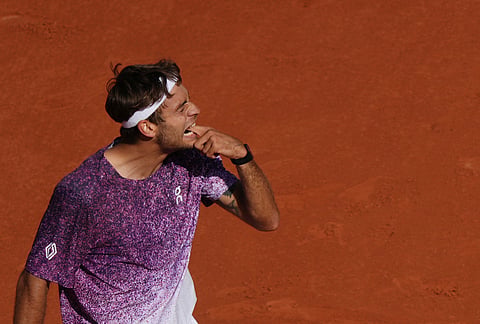 Flavio Cobolli of Italy reacts as he plays against Alexander Zverev of Germany during their men's final match at the French Open tennis tournament in Paris.