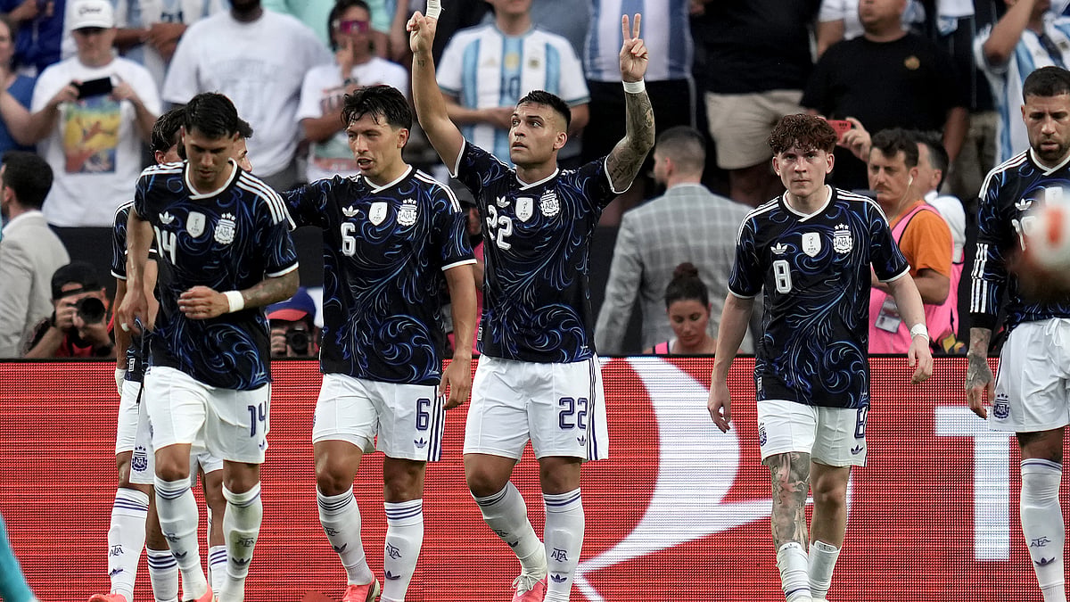 Argentina forward Lautaro Martínez (22) reacts after he scored on a penalty kick against Honduras during the first half of an international friendly soccer match Saturday, June 6, 2026, in College Station, Texas. - (AP Photo/Sam Craft)