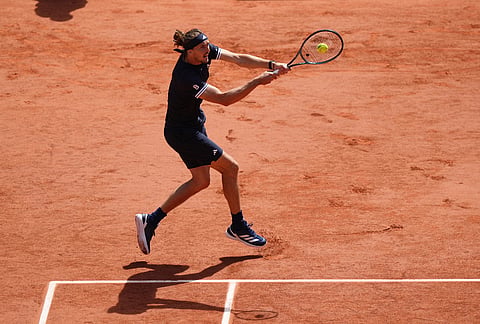 Alexander Zverev of Germany returns to Flavio Cobolli of Italy during their men's final match at the French Open tennis tournament in Paris.