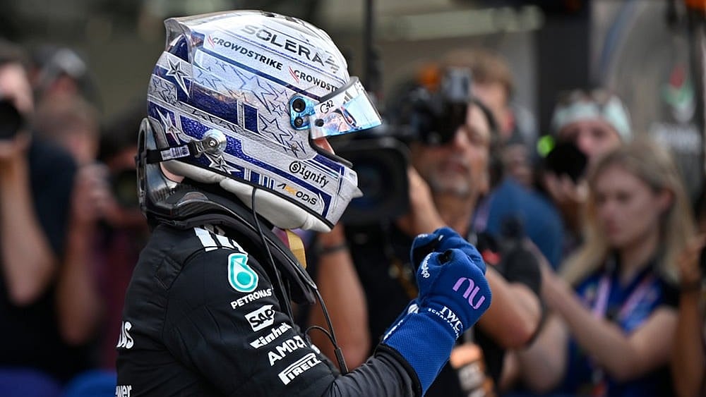 Mercedes driver Andrea Kimi Antonelli of Italy celebrates after setting the pole position during the qualifying session for the Monaco F1 Grand Prix, at the Monaco racetrack. - | Photo: AP/Philippe Magoni