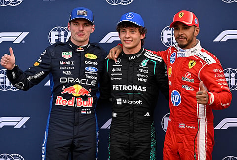 Pole position Mercedes driver Andrea Kimi Antonelli of Italy, center, is flanked by second fastest time Red Bull driver Max Verstappen of the Netherlands and third fastest time Ferrari driver Lewis Hamilton of Britain after the qualifying session for the Monaco F1 Grand Prix, at the Monaco racetrack.