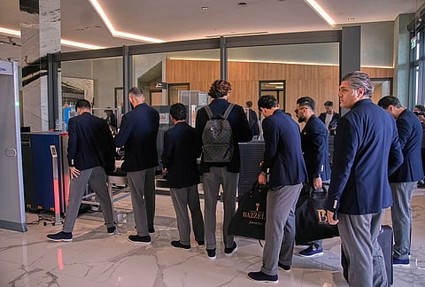 Iran's players go through a security process at Antalya airport, southern Turkey, before departing to Tijuana, Mexico, for the World Cup soccer tournament. 