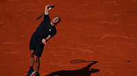 (AP Photo/Aurelien Morissard) : Germany's Alexander Zverev serves to Czech Republic's Jakub Mensik during the semifinal tennis match at the French Open in Paris, Friday, June 5, 2026. 
