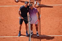 Alexander Zverev Vs Flavio Cobolli, French Open 2026 In Pics: See Best Photos From Roland Garros Final | Photo: AP/Aurelien Morissard : Flavio Cobolli of Italy, right, and Alexander Zverev of Germany pose for a picture before their men's final match at the French Open tennis tournament in Paris.