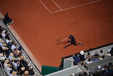 Alexander Zverev of Germany returns to Flavio Cobolli of Italy during their men's final match at the French Open tennis tournament in Paris.