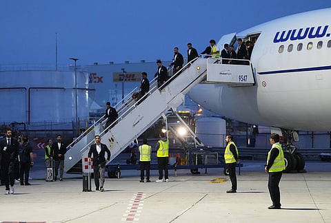 Players for Iran arrive for the World Cup soccer tournament in Tijuana, Mexico.