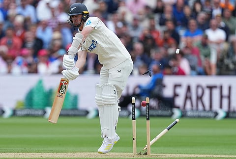 New Zealand's Matt Henry is bowled out by England's Gus Atkinson during the fourth day of the Test match between England and New Zealand at Lord's cricket ground in London.