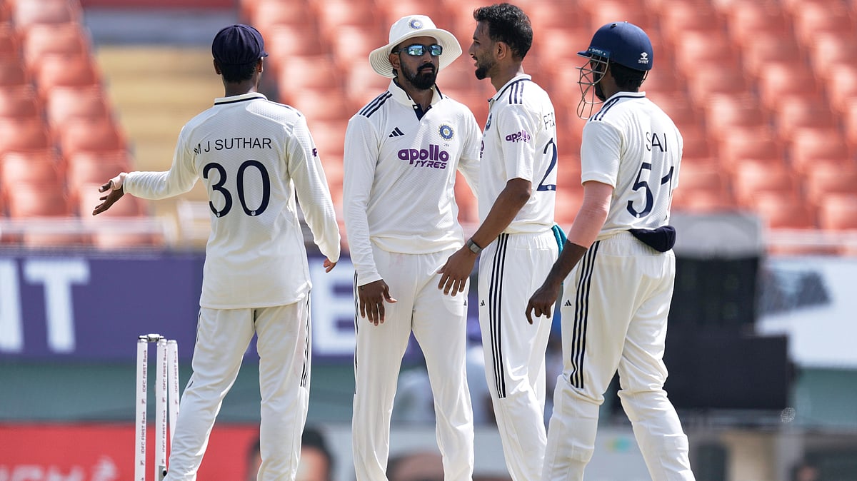 India's Prasidh Krishna, second right, celebrates with teammates the wicket of Afghanistan's Azmatullah Omarzai on day three of the cricket test match between Afghanistan and India in New Chandigarh, India, Monday, June 8, 2026 - (AP Photo/Ashwini Bhatia)
