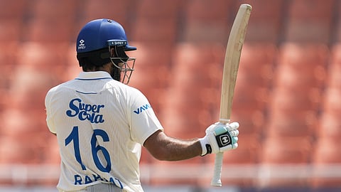 fghanistan's Rahmat Shah celebrates his fifty runs on day three of the cricket test match between Afghanistan and India in New Chandigarh, India, Monday, June 8, 2026