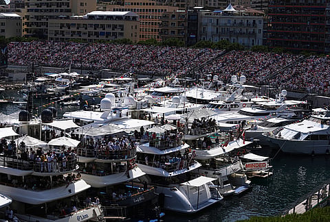 People watch during the Formula One Monaco Grand Prix race at the Monaco racetrack.