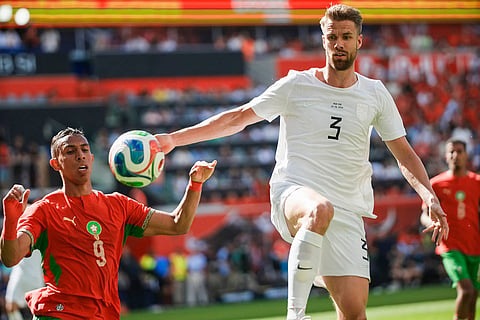 Norway defender Kristoffer Ajer (3) fights for the ball against Morocco forward Soufiane Rahimi (9) during an international friendly soccer match in Harrison, N.J.