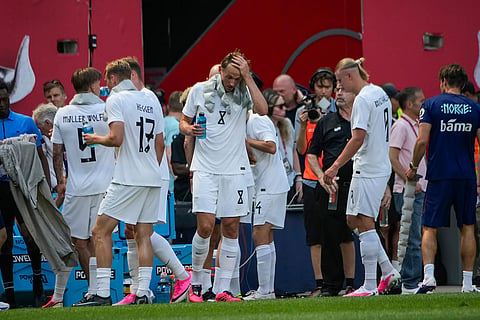 Norway players hydrate during an international friendly soccer match against Morocco in Harrison, N.J.