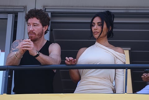 Kim Kardashian, right, attends wth former snowboarder Shaun White during the Formula One Monaco Grand Prix race at the Monaco racetrack.