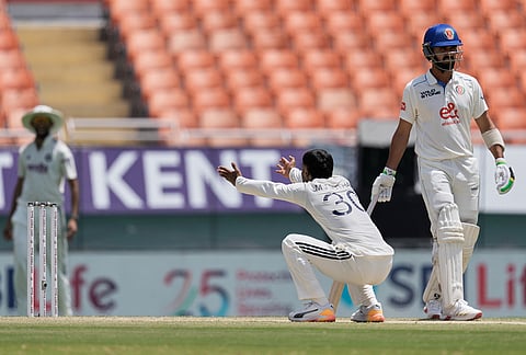 India's Manav Suthar, center, appeals unsuccessfully for the wicket of Afghanistan's Sediqullah Atal on day three of the cricket test match between Afghanistan and India in New Chandigarh.
