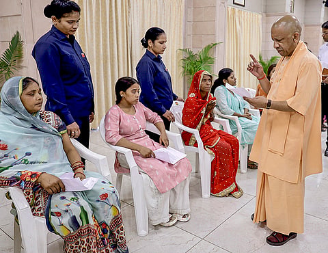 Uttar Pradesh Chief Minister Yogi Adityanath listens to the concerns of the people during ‘Janta Darshan’, at his official residence, in Lucknow.