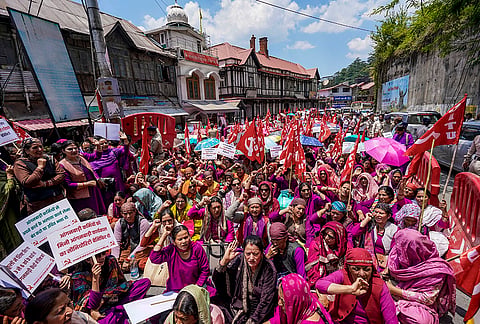 Anganwadi workers stage a protest under the banner of CITU over their long pending demands, outside Himachal Pradesh Secretariat, in Shimla.