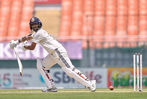 India's Washington Sundar, right, bats on day two of the cricket test match between Afghanistan and India in New Chandigarh.