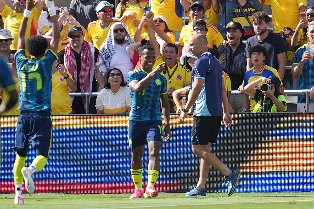 Colombia midfielder Jhon Arias, center, celebrates his goal with teammates. - AP/Gregory Bull