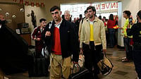 | Photo: AP/George Walker IV : Spain midfielder Pedri, left, arrives with teammates for the World Cup soccer tournament in Chattanooga, Tennessee.