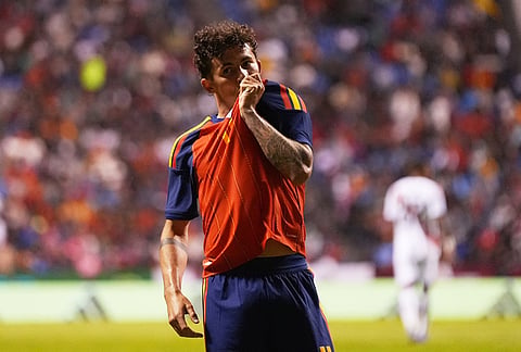 Spain's Yeremy Pino celebrates after scoring his side's third goal during an international soccer match against Peru in Puebla, Mexico.