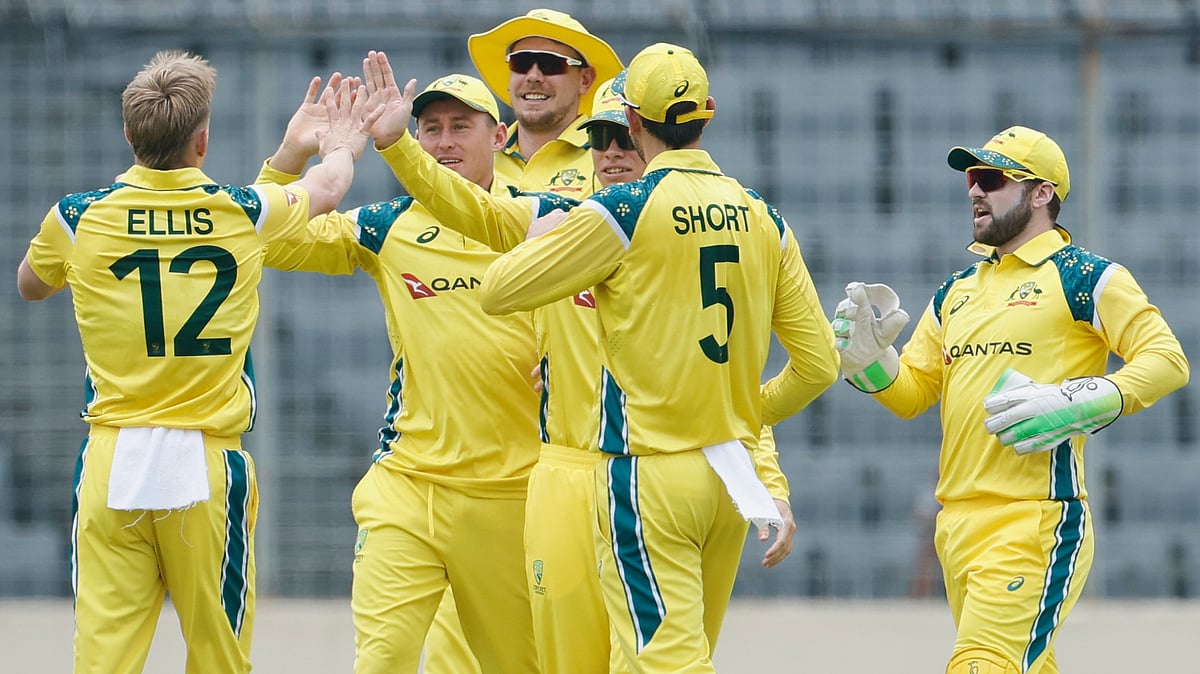 Australia's Nathan Ellis, left, celebrates with teammates the wicket of Bangladesh's Saif Hassan during the first one day international cricket match between Australia and Bangladesh in Mirpur, Bangladesh, Tuesday, June 9, 2026 - (AP Photo/Mosaraf Hossain)