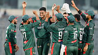AP Photo : Bangladesh's Nahid Rana celebrates with teammates the wicket of Australia's Liam Scott during the first one day international cricket match between Australia and Bangladesh in Mirpur.