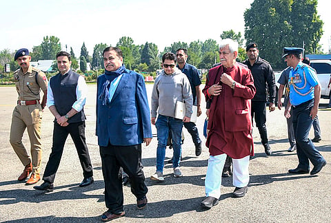 Union Minister for Road Transport and Highways Nitin Gadkari being received by Jammu and Kashmir LG Manoj Sinha on the former’s arrival in Srinagar. 
