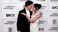 (Photo by Charles Sykes/Invision/AP) : Justin Trudeau, left, and Katy Perry attend the "Katy Perry: The Lifetimes Tour - Live from Paris" world premiere at the OKX Theater at BMCC Tribeca Performing Arts Center during the Tribeca Festival on Monday, May 8, 2026, in New York. 