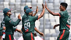 | Photo: AP/Mosaraf Hossain : Bangladesh's Nahid Rana, right, celebrates the wicket of New Zealand's Muhammad Abbas during the second one day international cricket match between Bangladesh and New Zealand in Mirpur, Bangladesh.