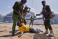 Day In Pics: June 10, 2026 | Photo: AP/Brian Inganga : A protester is arrested by anti-riot police during a demonstration against a proposed Ebola quarantine center to be established by the United States at Laikipia Air Base in Nanyuki, Kenya.