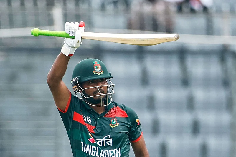 Bangladeshs Mosaddek Hossain Saikat celebrates his fifty runs