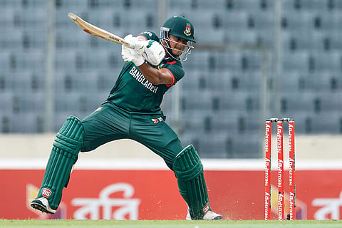 Bangladesh's Taskin Ahmed plays a shot during the first one day international cricket match between Australia and Bangladesh in Mirpur, Bangladesh.