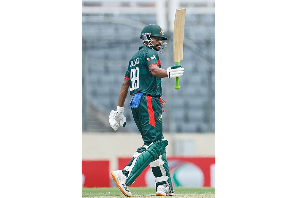 Bangladeshs Najmul Hossain Shanto celebrates his fifty runs