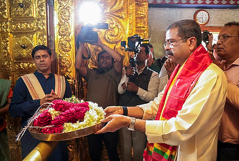 Union Education Minister Dharmendra Pradhan offers prayers at the Jagannath Temple on the occassion of the completion of 12 years of the NDA government, in Hauz Khas, New Delhi. 