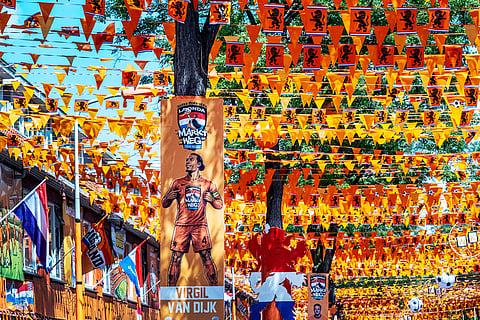 Marktweg Street in The Hague, Netherlands, is decorated ahead of the start of the soccer World Cup.